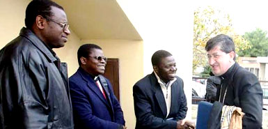 Uwayezu, far left, meets Giuseppe Betori, archbishop of Florence,